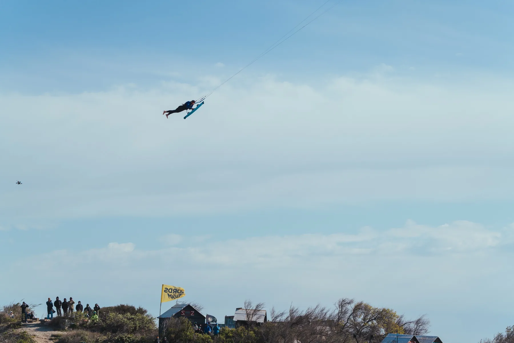 Finn Flügel boosting a megaloop over the lagoon at Port Barcarès